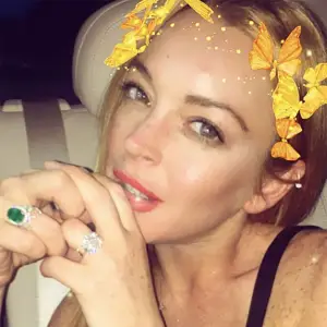 Lindsay Lohan Shows Off Her Engagement Ring After Cheating Scandal
