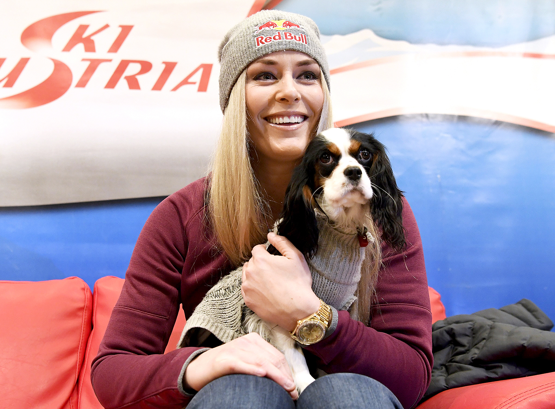 Lindsey Vonn and her dog Lucy are pictured during a press conference in Zauchensee, Austria, on January 12, 2017.