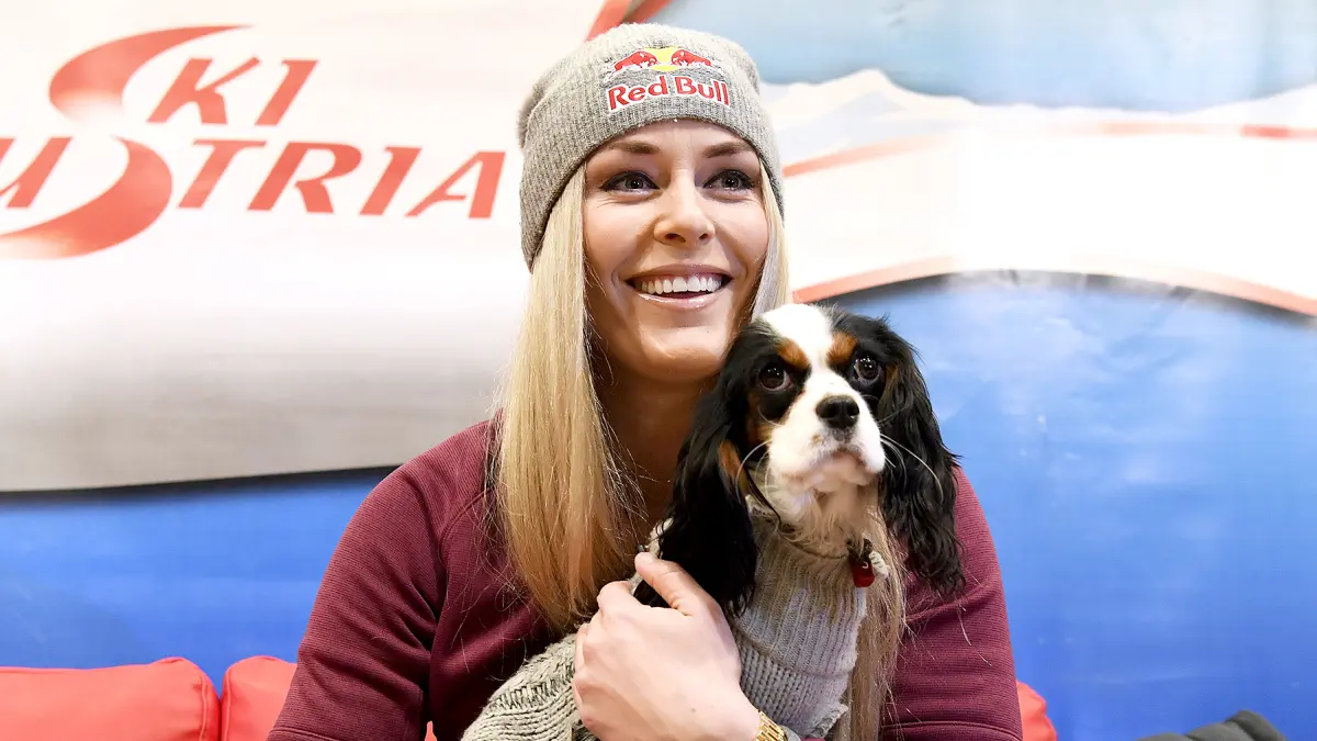 Lindsey Vonn and her dog Lucy are pictured during a press conference in Zauchensee, Austria, on January 12, 2017.