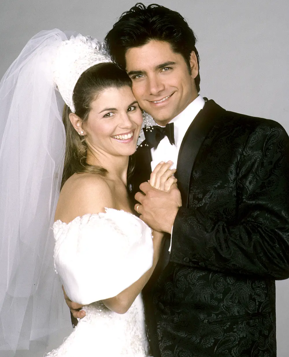 Lori Loughlin and John Stamos in Full House, 1991.