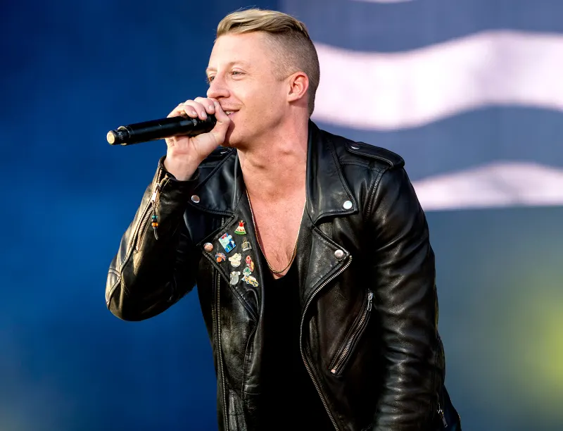 Macklemore of Macklemore & Ryan Lewis performs on stage at Leeds Festival at Bramham Park on August 22, 2014 in Leeds, United Kingdom.