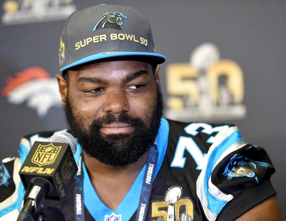 Michael Oher #73 of the Carolina Panther addresses the media prior to Super Bowl 50 at the San Jose Convention Center/ San Jose Marriott on February 2, 2016 in San Jose, California.