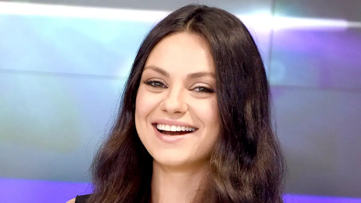 Mila Kunis rings the closing bell at NASDAQ on July 28, 2016 in New York City.
