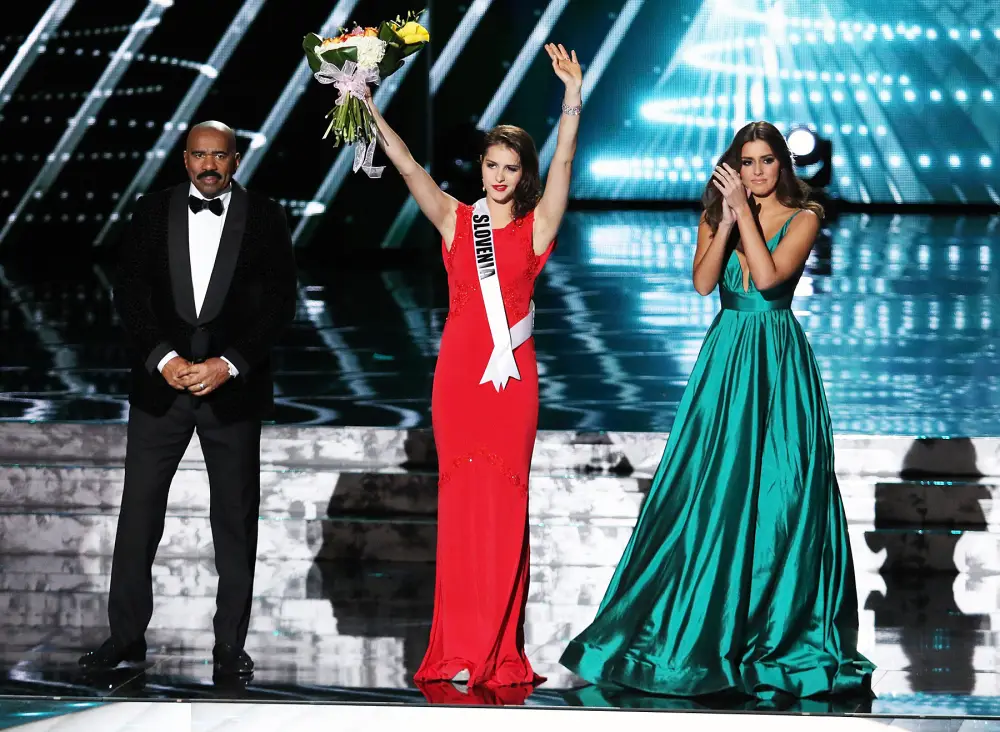 Steve Harvey, Miss Slovenia Ana Halozan and Paulina Vega onstage at the 2015 Miss Universe Pageant