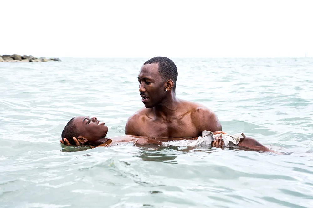 Alex Hibbert and Mahershala Ali in Moonlight