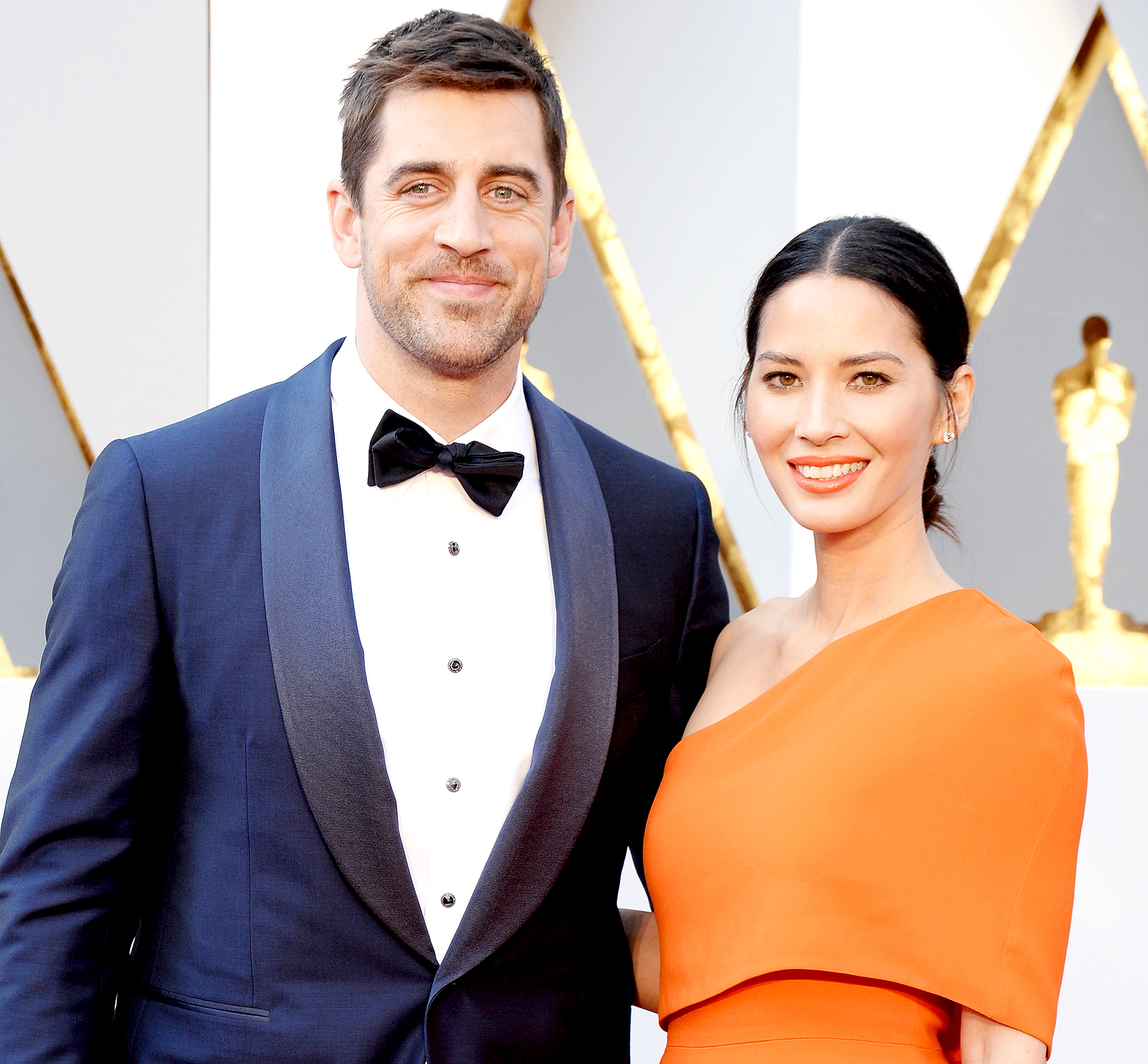 Olivia Munn and Aaron Rodgers attend the 88th Annual Academy Awards at Hollywood & Highland Center in Hollywood on February 28, 2016.