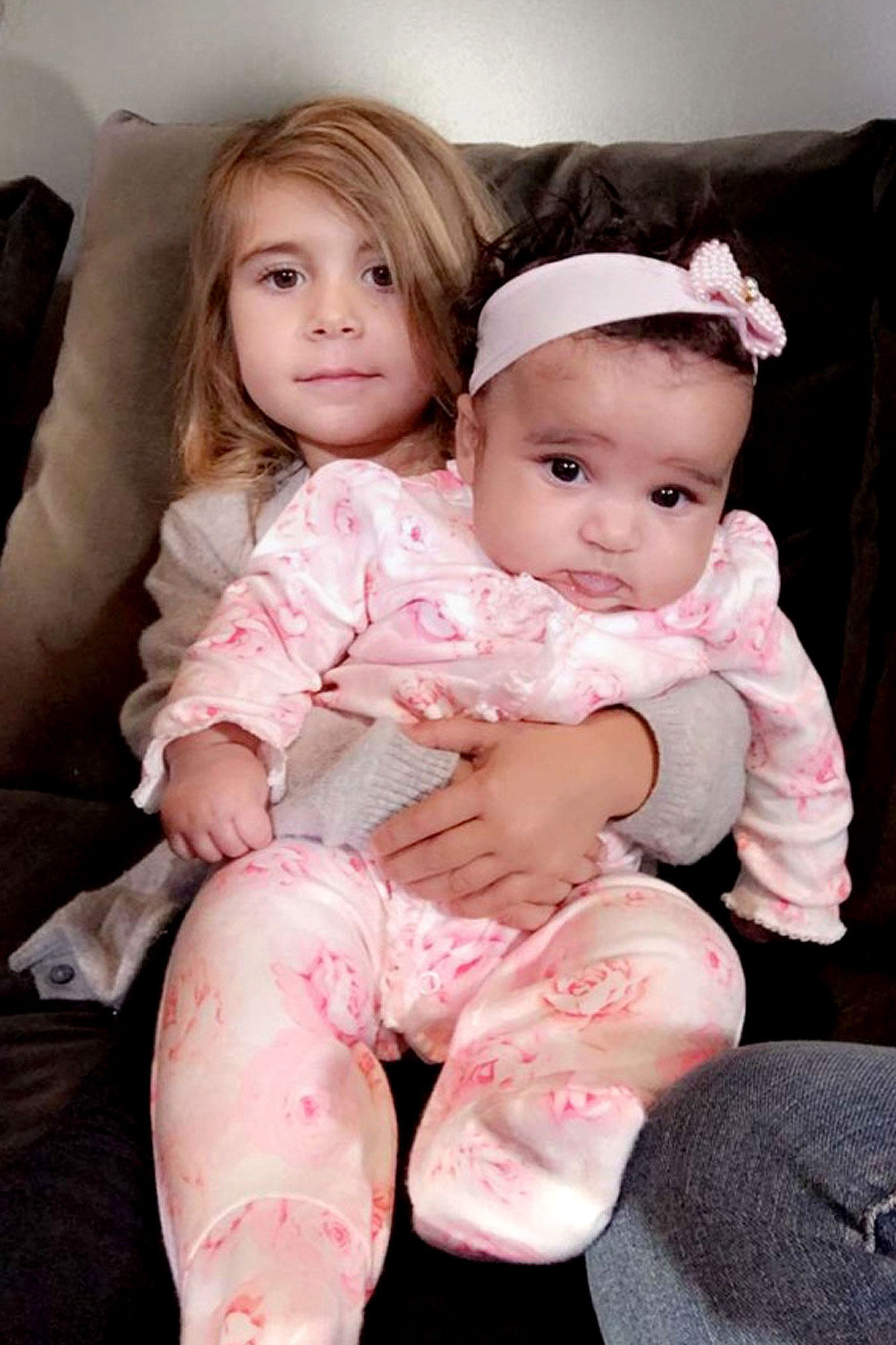 Penelope Disick holds Dream Kardashian in a snap that Rob posted.