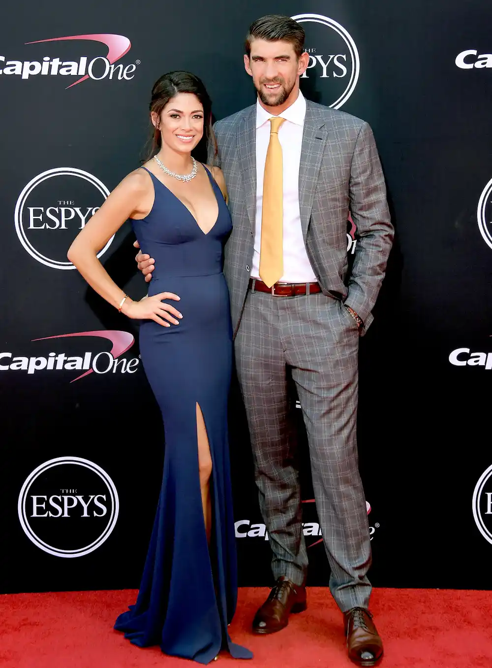 Michael Phelps (R) and Nicole Johnson attend The 2017 ESPYS at Microsoft Theater on July 12, 2017 in Los Angeles, California.
