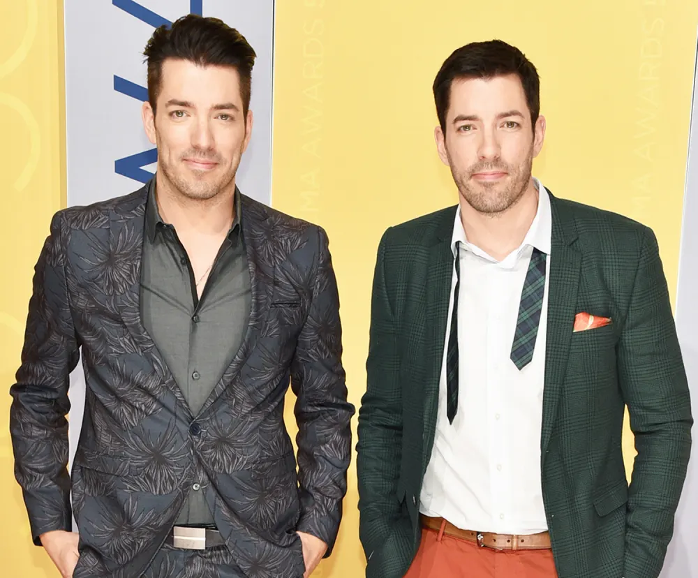 Jonathan Scott and Drew Scott attend the 50th annual CMA Awards at the Bridgestone Arena on November 2, 2016 in Nashville, Tennessee.