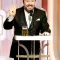 Ricky Gervais speaks onstage during the 73rd Annual Golden Globe Awards.