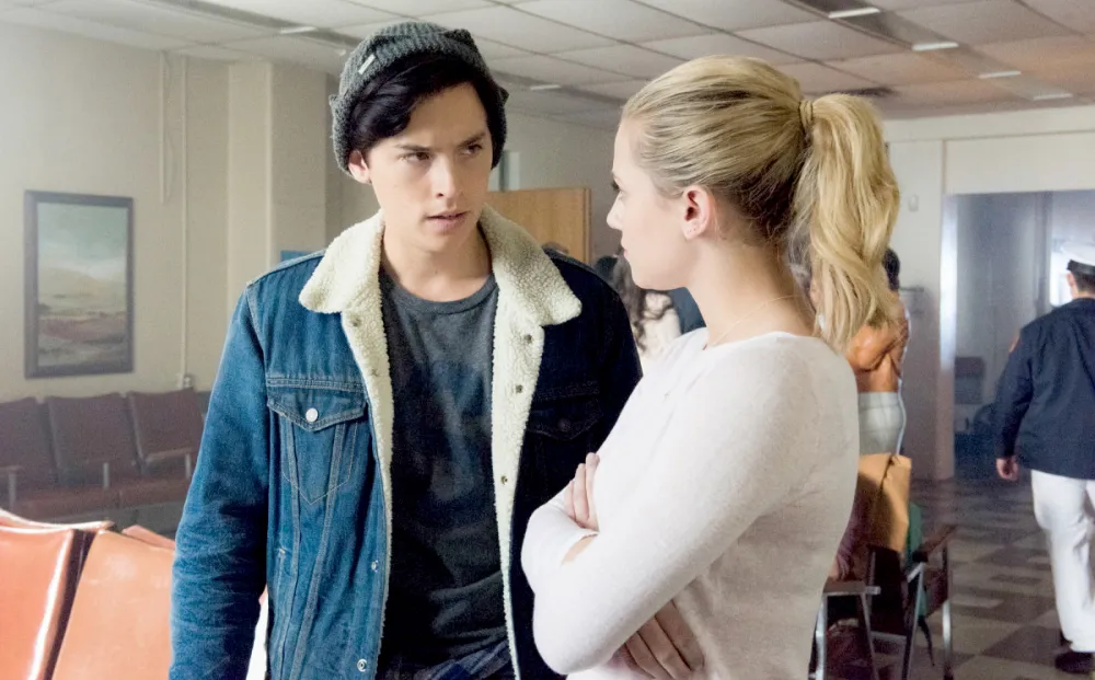 Cole Sprouse as Jughead Jones and Lili Reinhart as Betty Cooper on Riverdale