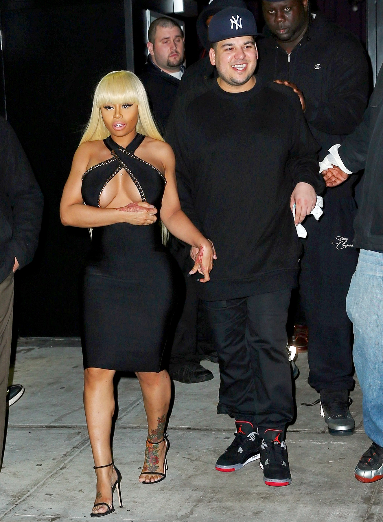 Rob Kardashian holds fiancee Blac Chyna's hand when walking out of ACES strip club in Queens, NY on their first New York appearance together
