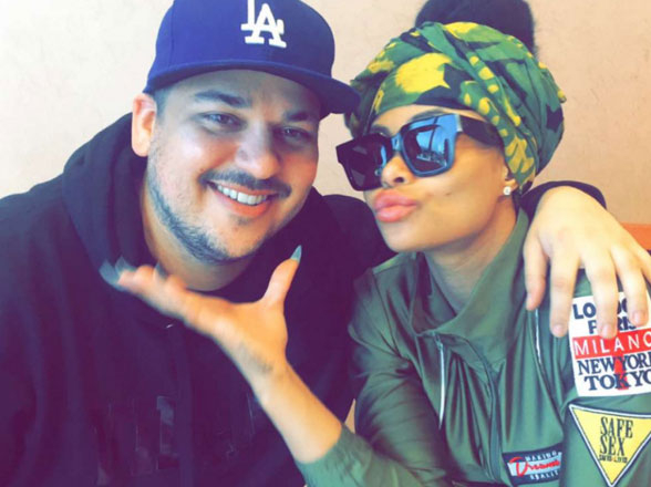 Rob Kardashian smiles with Blac Chyna