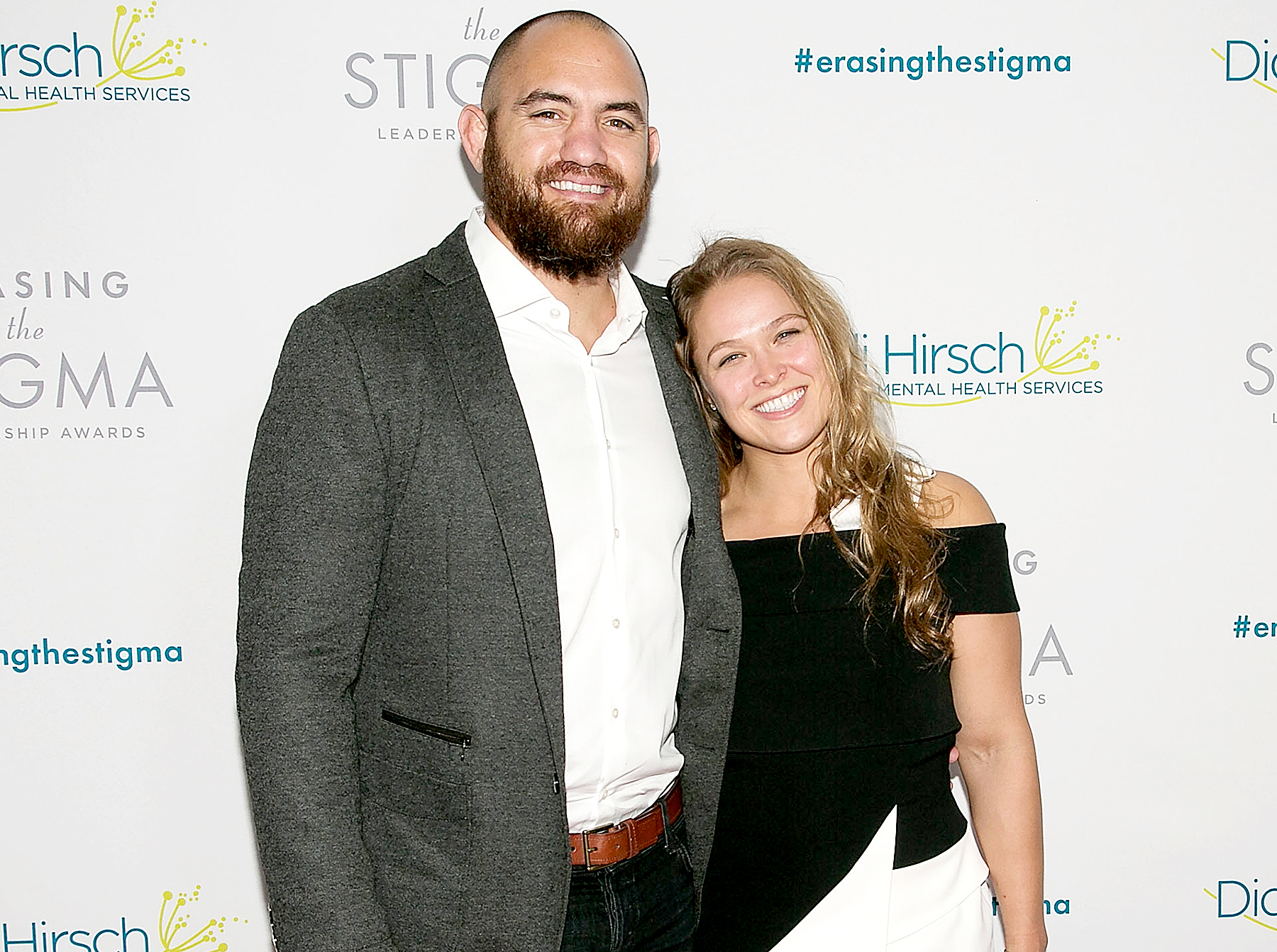 Travis Browne and Ronda Rousey arrive for the 20th Anniversary Erasing The Stigma Leadership Awards at The Beverly Hilton Hotel on April 28, 2016 in Beverly Hills, California.