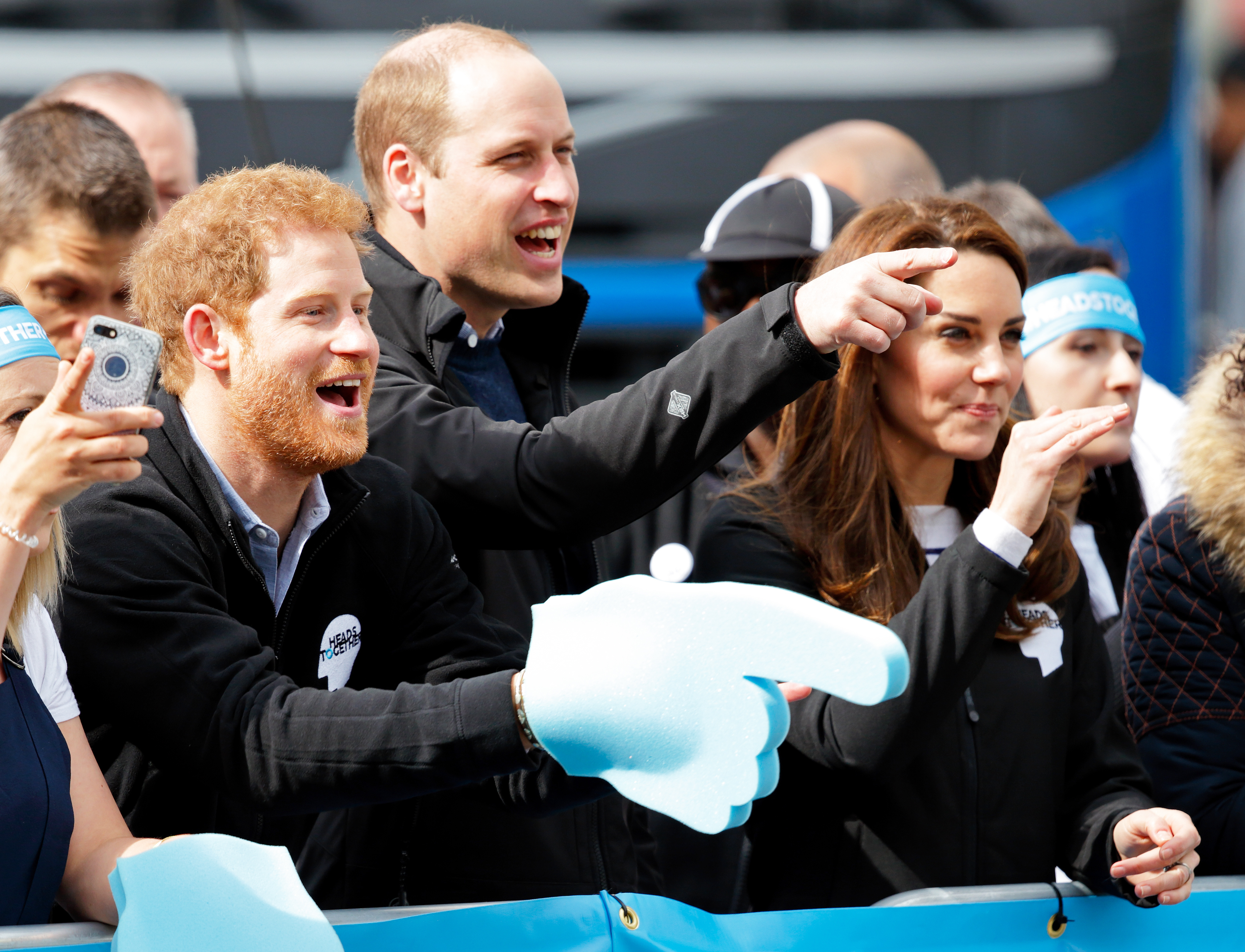 Prince Harry, Prince William, Duke of Cambridge and Catherine, Duchess of Cambridge cheer on runners talking part in the 2017 Virgin Money London Marathon on April 23, 2017 in London, England.