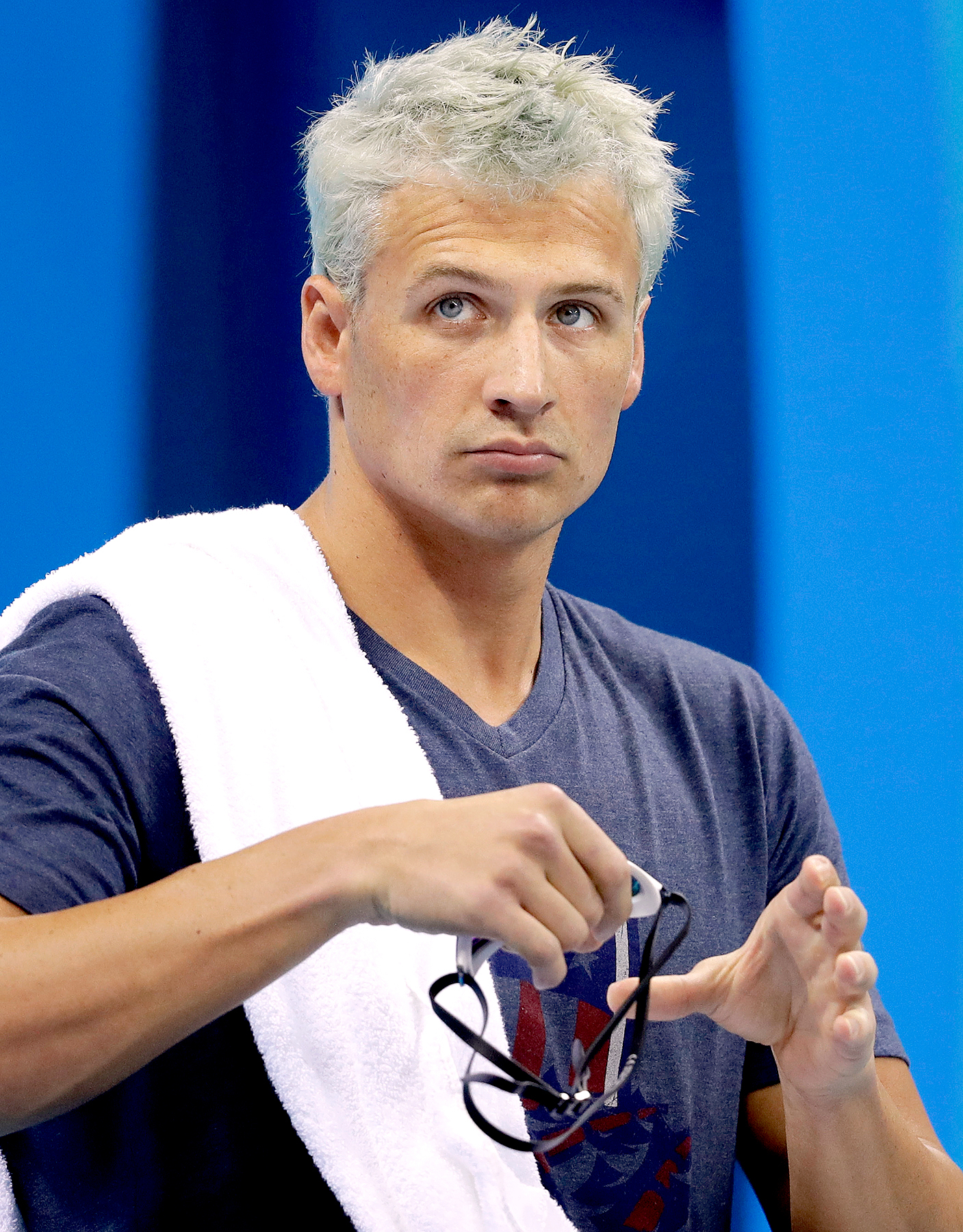 Ryan Lochte prepares before a men's 4x200-meter freestyle heat during the swimming competitions at the 2016 Summer Olympics, Tuesday, Aug. 9, 2016.