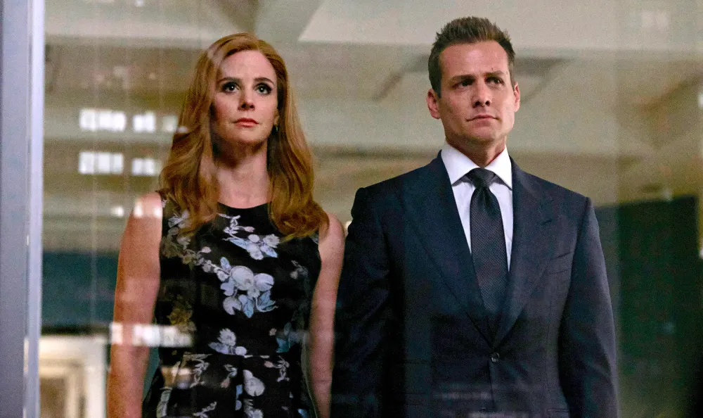 Sarah Rafferty as Donna Paulsen and Gabriel Macht as Harvey Specter on 'Suits.'