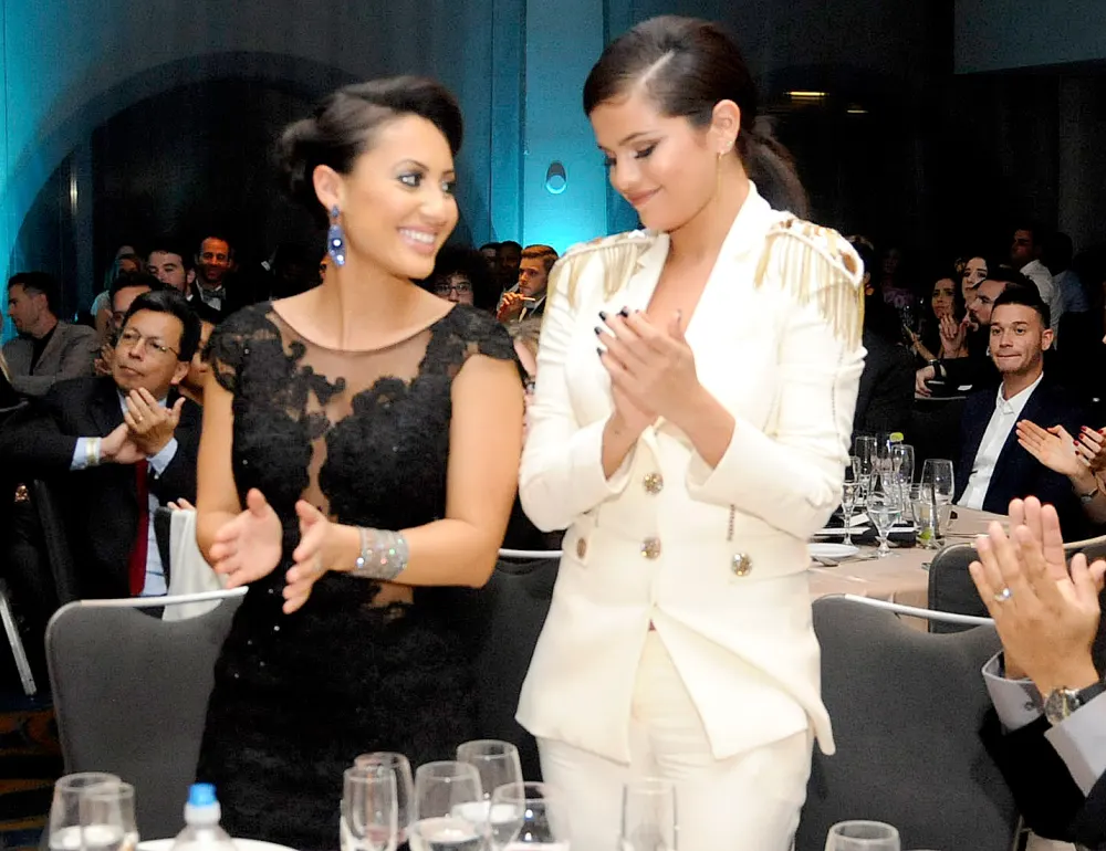 Francia Raisa and Selena Gomez attend the Unlikely Heroes' 3rd Annual Awards Dinner And Gala at Sofitel Hotel on November 8, 2014 in Los Angeles, California.