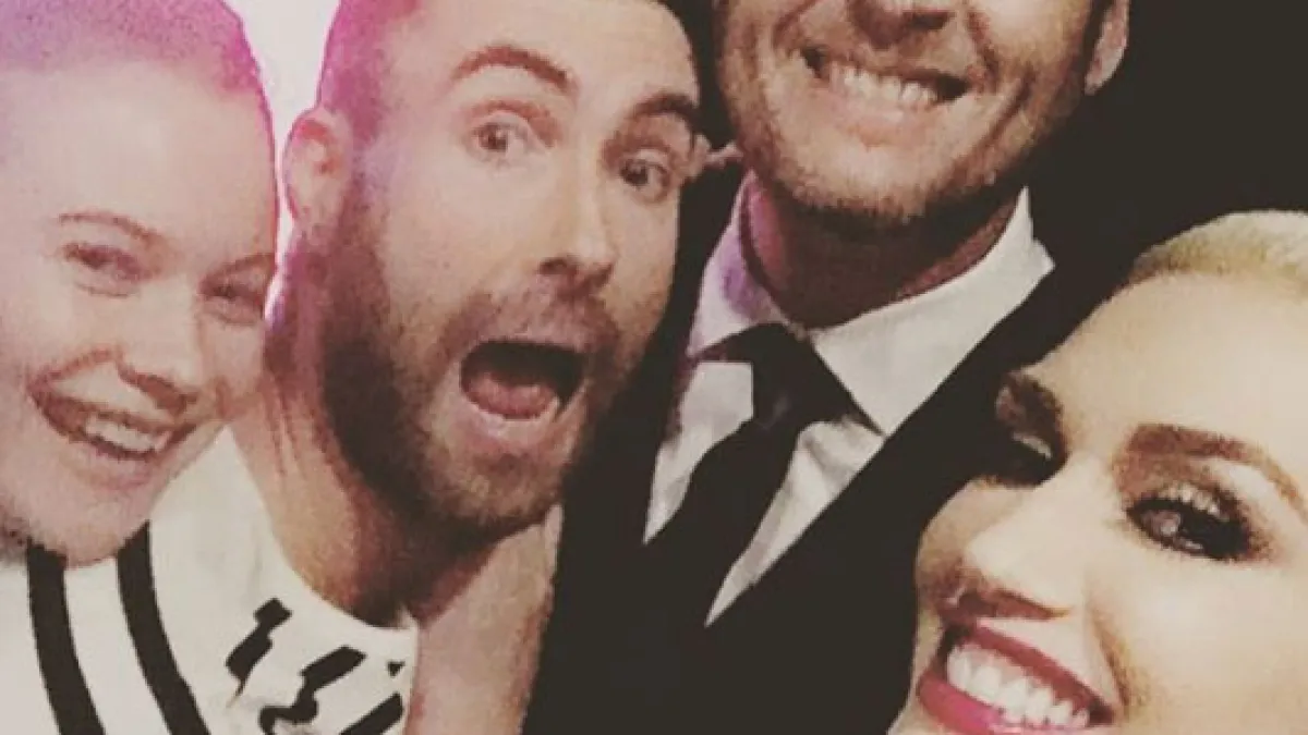 Gwen Stefani and Blake Shelton take a selfie with Adam Levine and Behati Prinsloo