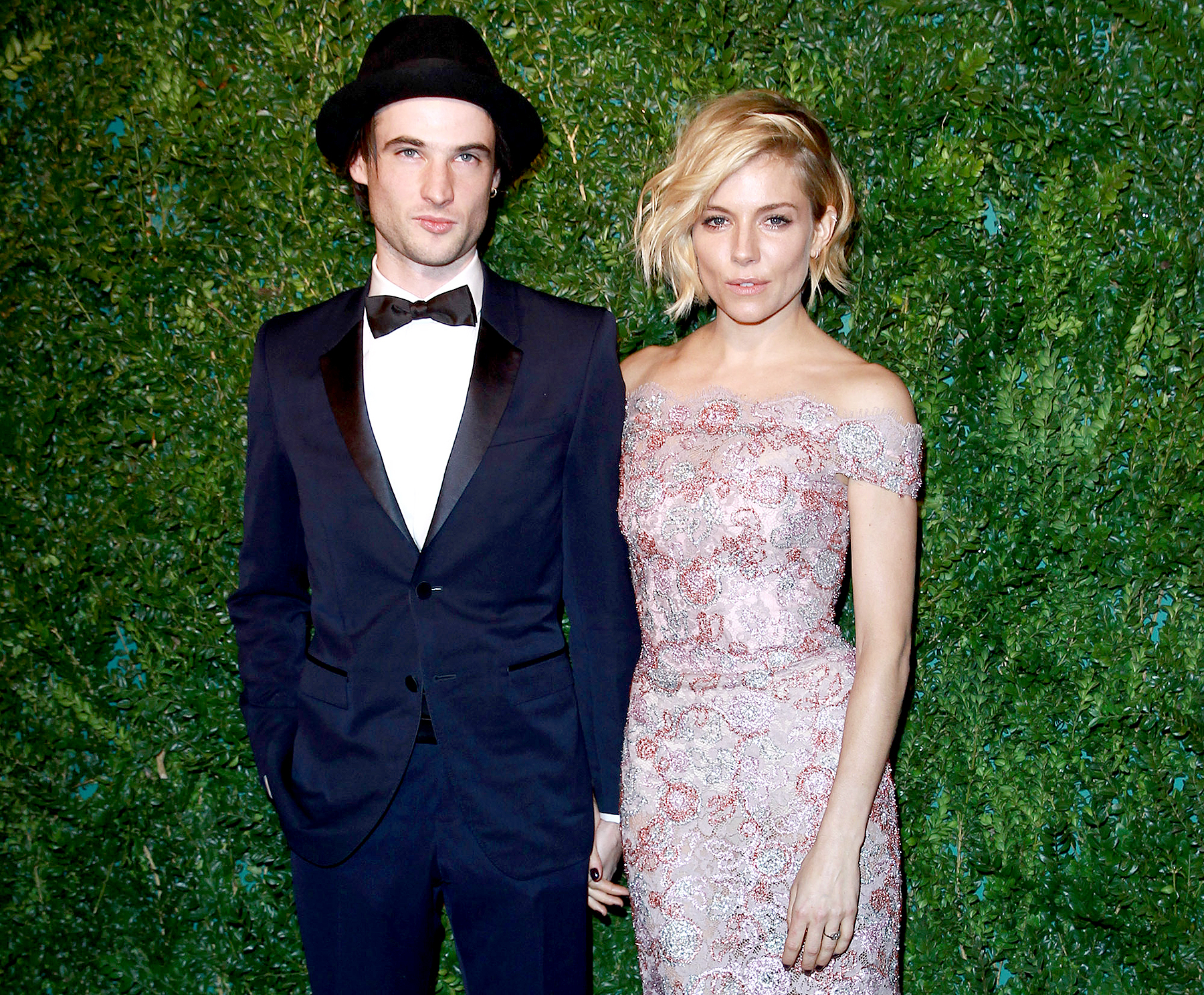 Sienna Miller and Tom Sturridge attends the 60th London Evening Standard Theatre Awards at London Palladium on November 30, 2014 in London, England.