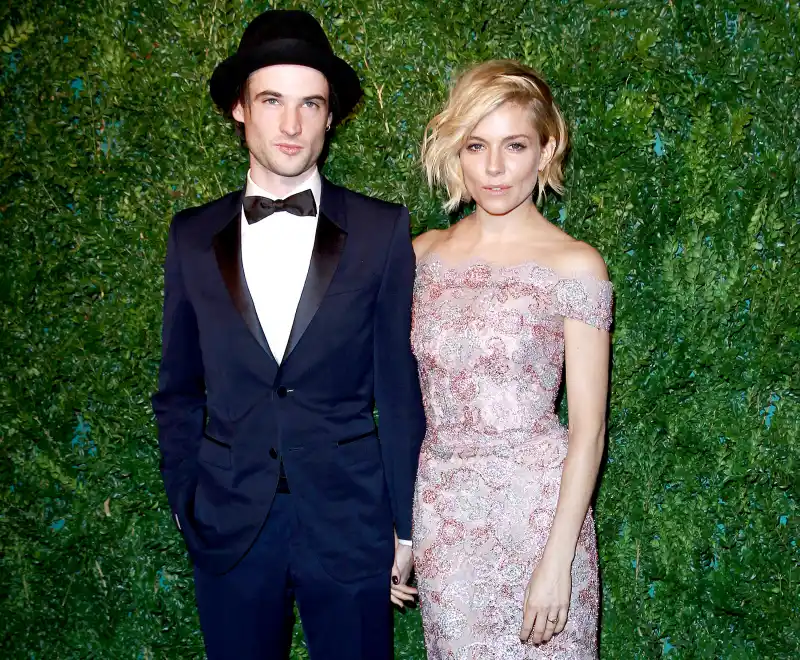 Sienna Miller and Tom Sturridge attends the 60th London Evening Standard Theatre Awards at London Palladium on November 30, 2014 in London, England.