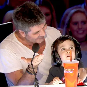 Simon cowell son 2 c4b2a857 b559 4e74 9e99 dda10af4f5d0