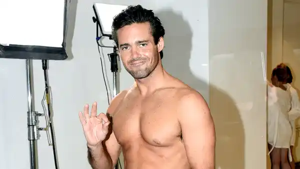 Spencer Matthews poses in a shop window to launch Lyst's augmented reality dressing experience on September 16, 2016 in London, England.