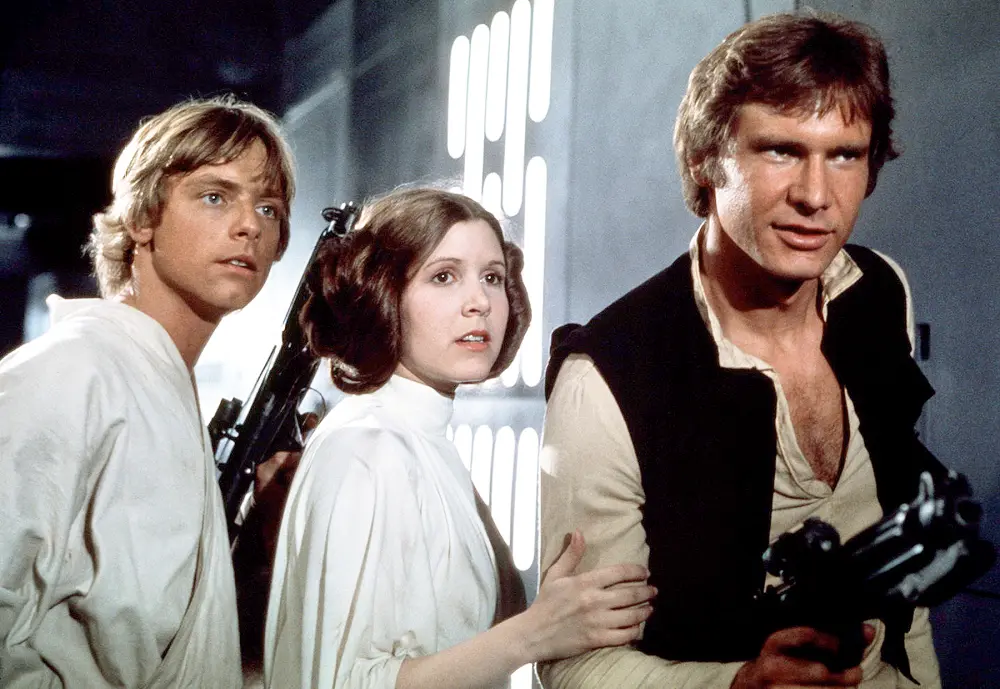 Mark Hamill, Carrie Fisher and Harrison Ford on the set of Star Wars: Episode IV - A New Hope.