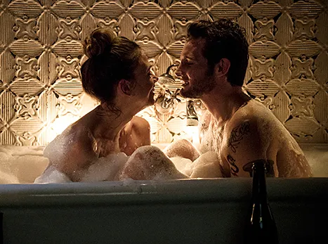 Sutton Foster and Nico Tortorella in bathtub