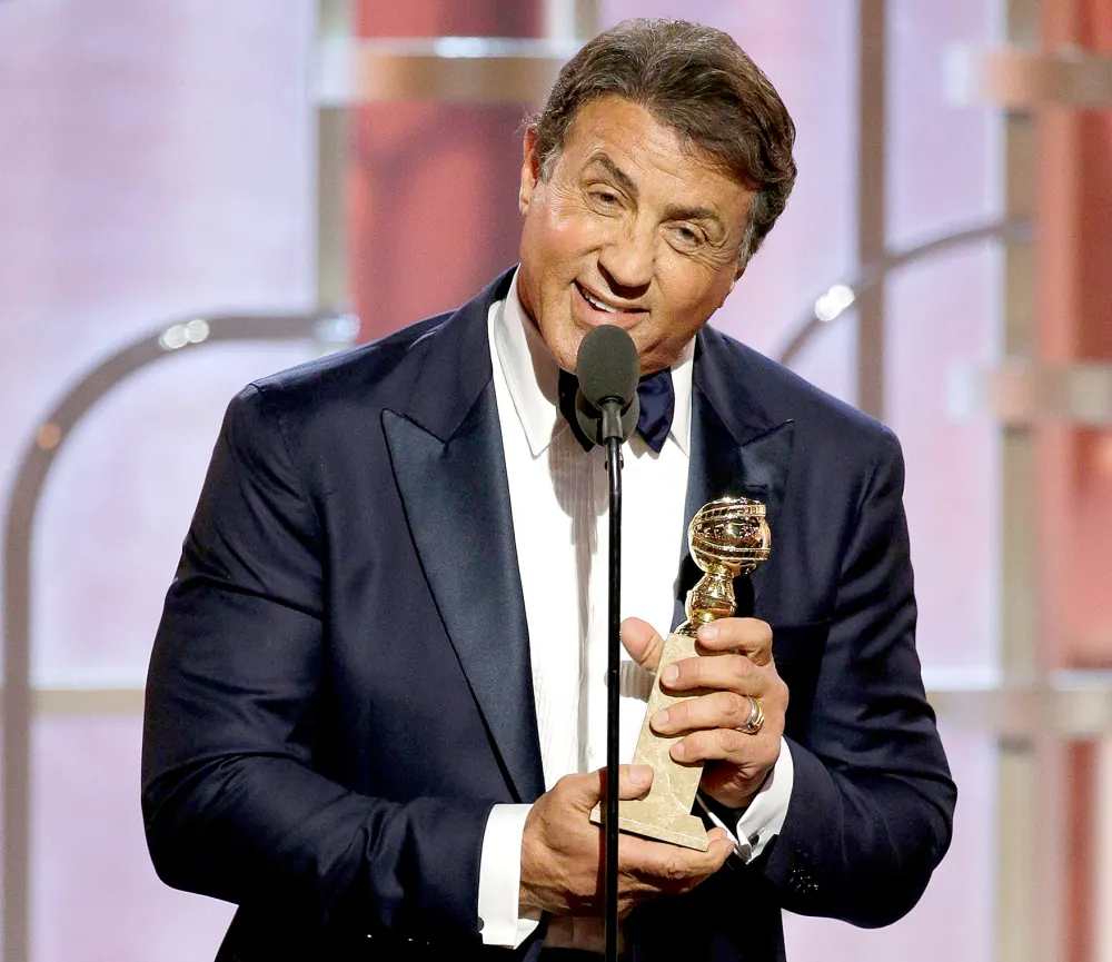 Sylvester Stallone accepts the award for Best Supporting Actor &mdash; Motion Picture.