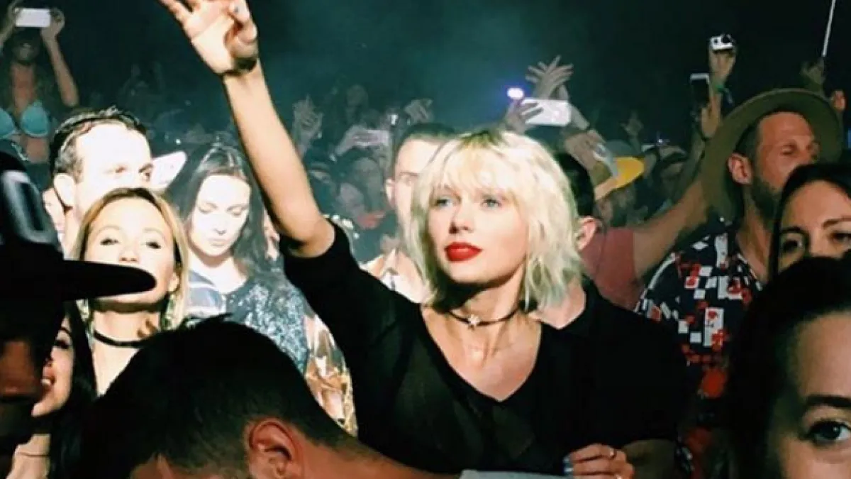 Taylor Swift looks at Calvin Harris with heart eyes