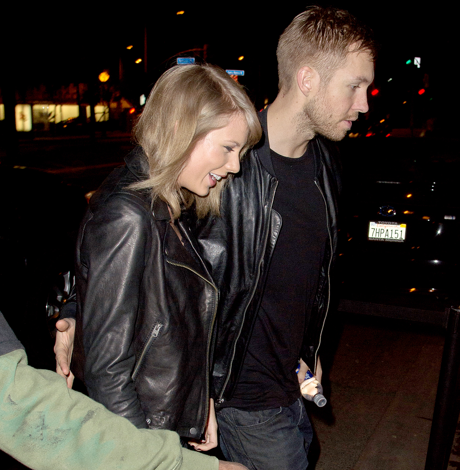 Taylor Swift and Calvin Harris arrive back in Los Angeles together via private jet, after a romantic getaway in the Caribbean islands! The pair were seen having a hug and kiss before heading separate ways.