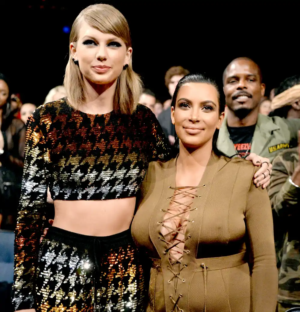 Taylor Swift and Kim Kardashian West attend the 2015 MTV Video Music Awards.