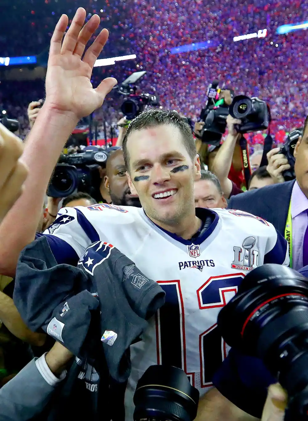 om Brady #12 of the New England Patriots celebrates after defeating the Atlanta Falcons 34-28 in overtime of Super Bowl 51 at NRG Stadium on February 5, 2017 in Houston, Texas.