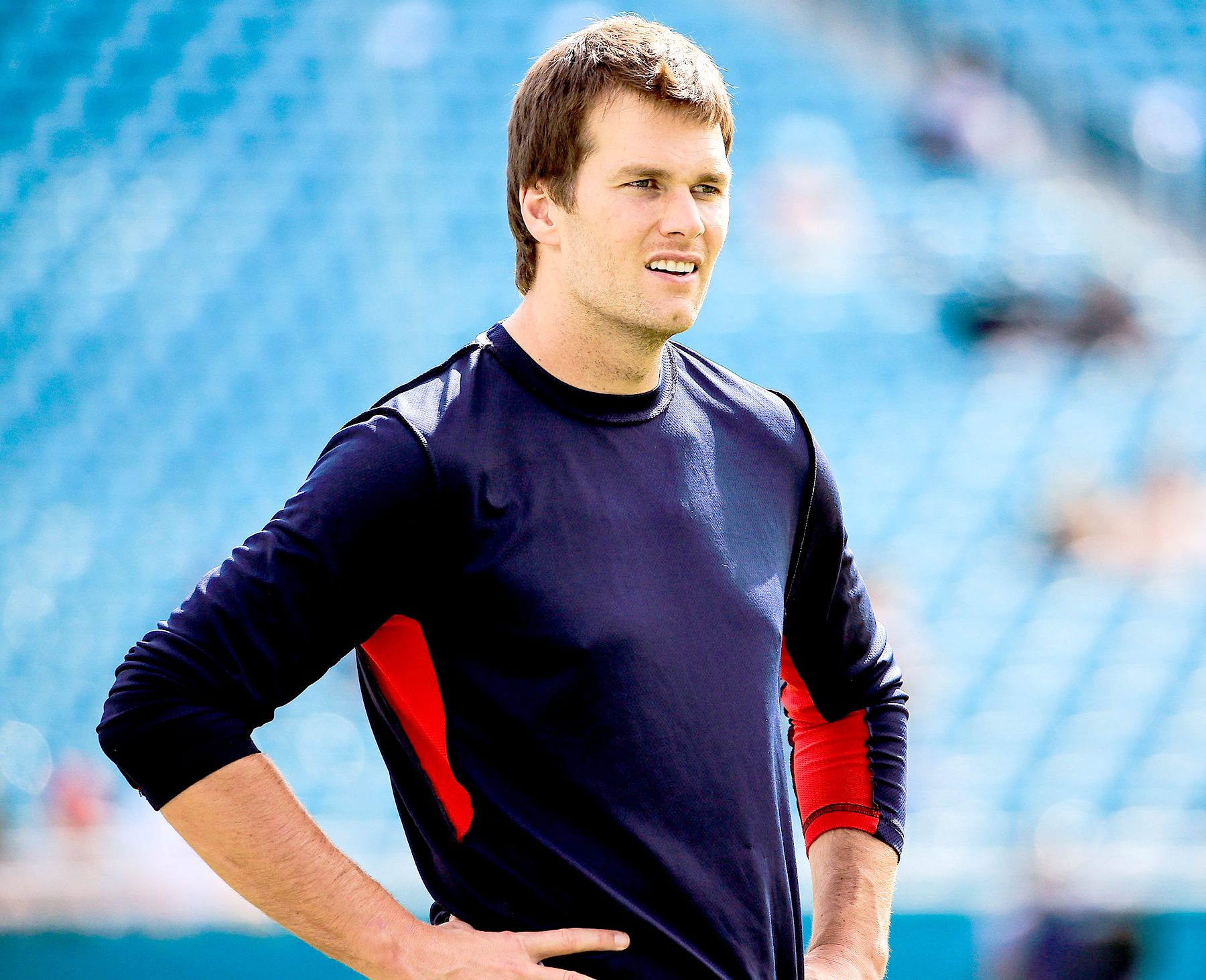 Tom Brady #12 of the New England Patriots warms up before the game against the Miami Dolphins at Sun Life Stadium on January 3, 2016 in Miami Gardens, Florida.