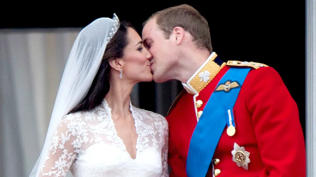 Catherine, Duchess of Cambridge and Prince William, Duke of Cambridge on the balcony at Buckingham Palace following their wedding at Westminster Abbey on April 29, 2011 in London, England.