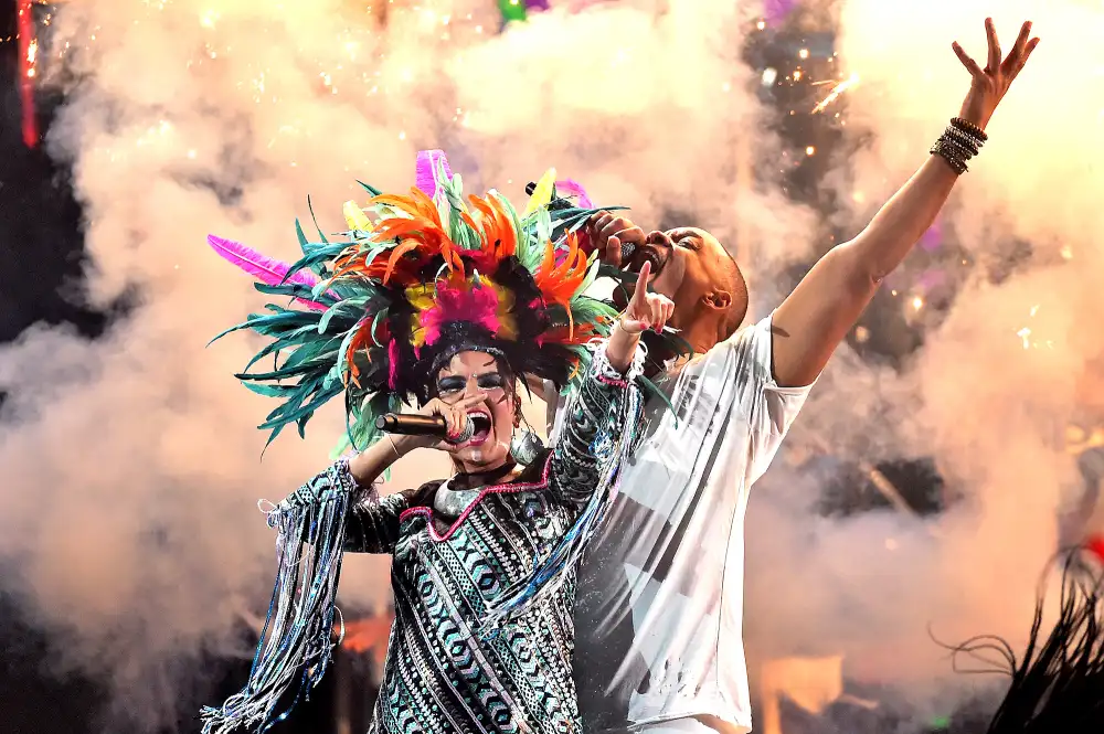 Liliana Saumet of Bomba Estereo and Will Smith perform onstage during the 16th Latin GRAMMY Awards at the MGM Grand Garden Arena on November 19, 2015 in Las Vegas, Nevada.