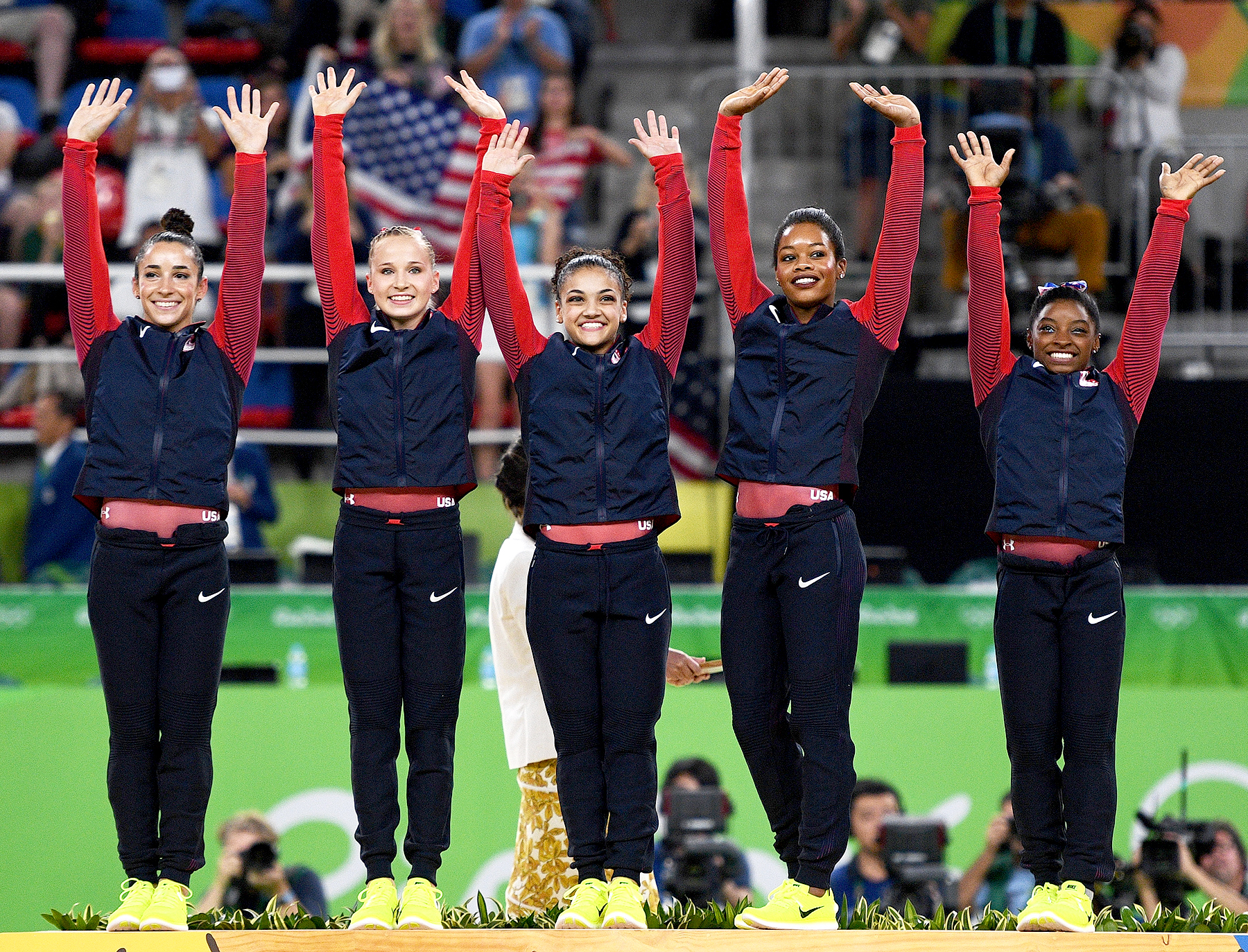 Gold Medalists Simone Biles, Gabrielle Douglas, Lauren Hernandez, Madison Kocian and Alexandra Raisman of the United States celebrate on the podium at the medal ceremony for the Artistic Gymnastics Women's Team Final on Day 4 of the Rio 2016 Olympic Games at the Rio Olympic Arena on August 9, 2016 in Rio de Janeiro, Brazil.