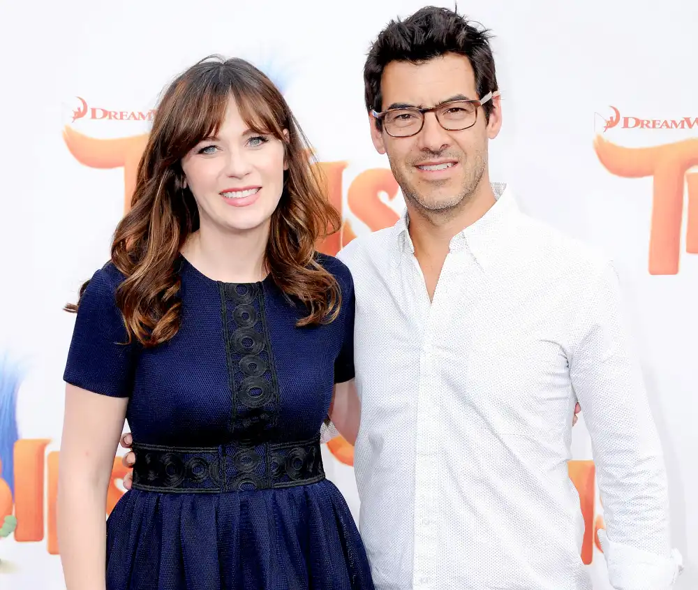 Zooey Deschanel and Jacob Pechenik attend the premiere of 20th Century Fox's 'Trolls' at Regency Village Theatre on October 23, 2016 in Westwood, California.